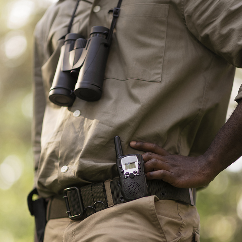 cropped image of police officer walking away